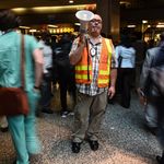 Commuters transfer from Long Island railroad service to a New York City subway at the Barclays Center subway station on July 10, 2017 (Getty Images)